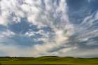 Field in the Palouse region of Washington with an interesting cloud formation Art Print